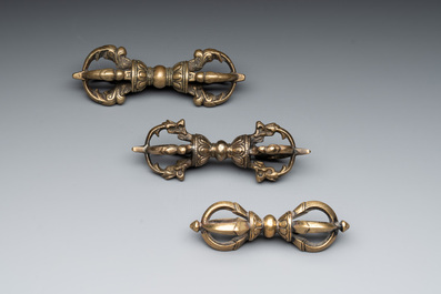 Three Tibetan bronze vajra and a copper incense burner, 18/20th C.