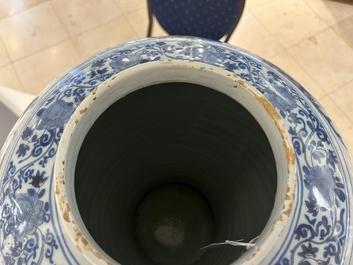 A very large Dutch Delft blue and white chinoiserie baluster vase, last quarter 17th C.