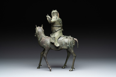 A Vietnamese bronze brush washer on stand and a Chinese bronze warrior on horseback, 19th C.