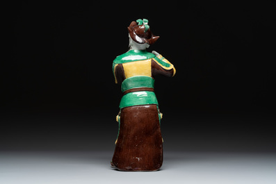 A pair of Chinese sancai-glazed rooftiles, a pair of Buddhist lions and a warrior, Ming and later