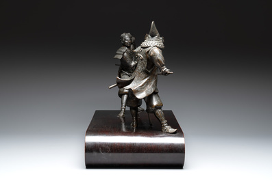 A fine pair of Japanese bronze warriors mounted on a wooden stand, Meiji/Taisho, 19/20th C.