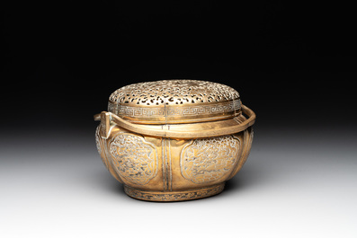 A Chinese bronze 'landscape' handwarmer, Qiu Fuxi 丘福禧 mark, 19th C.