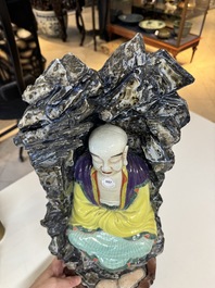 A Chinese polychrome-glazed group with Vanavasin, Qianlong mark, 19th C.