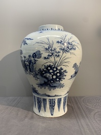 A very large Dutch Delft blue and white chinoiserie baluster vase, last quarter 17th C.
