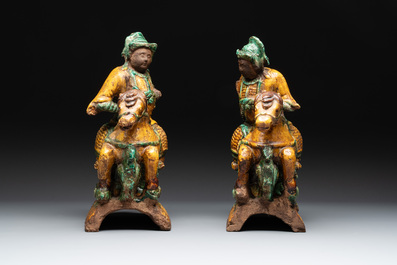 A pair of Chinese sancai-glazed rooftiles, a pair of Buddhist lions and a warrior, Ming and later