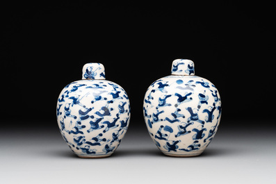 A pair of Chinese blue and white soft paste '100 boys' covered jarlets and a seal paste box, Kangxi mark, 19th C.
