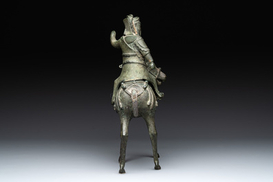 A Vietnamese bronze brush washer on stand and a Chinese bronze warrior on horseback, 19th C.