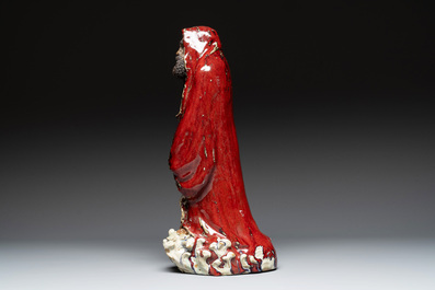 A Chinese Shiwan flamb&eacute;-glazed figure of a Luohan, Deng 邓 seal mark, dated 1927