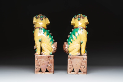 A pair of Chinese sancai-glazed rooftiles, a pair of Buddhist lions and a warrior, Ming and later
