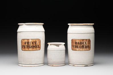 Three rare blue and white Delftware albarelli with painted content medallions and paper shop labels, Northern Europe, 18th C.