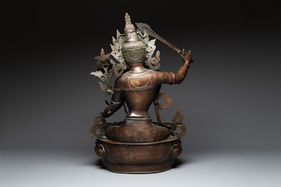 A very large Nepalese bronze sculpture of Manjusri, 19/20th C.