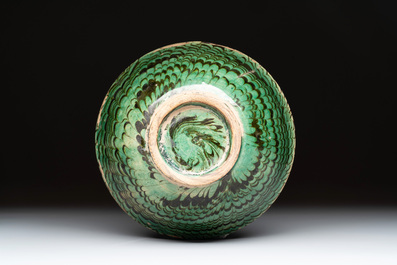 A Chinese green-glazed marbled bowl, probably Tang