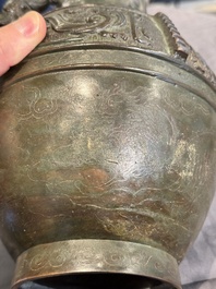 A Chinese silver-inlaid archaistic bronze vase, Da Tang Yuan Nian 大唐元年 mark, 17/18th C.