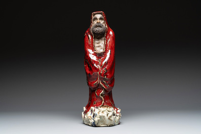 A Chinese Shiwan flamb&eacute;-glazed figure of a Luohan, Deng 邓 seal mark, dated 1927