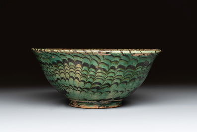 A Chinese green-glazed marbled bowl, probably Tang