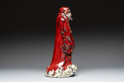 A Chinese Shiwan flamb&eacute;-glazed figure of a Luohan, Deng 邓 seal mark, dated 1927