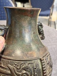 A Chinese silver-inlaid archaistic bronze vase, Da Tang Yuan Nian 大唐元年 mark, 17/18th C.