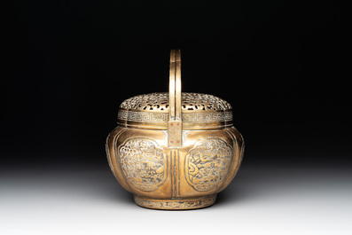 A Chinese bronze 'landscape' handwarmer, Qiu Fuxi 丘福禧 mark, 19th C.