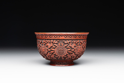 A Chinese cinnabar lacquer quadrifoil covered box and a 'lotus and shou' bowl, 19th C.