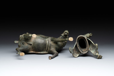 A Vietnamese bronze brush washer on stand and a Chinese bronze warrior on horseback, 19th C.