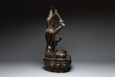 A very large Nepalese bronze sculpture of Manjusri, 19/20th C.