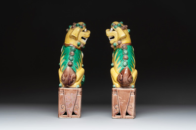A pair of Chinese sancai-glazed rooftiles, a pair of Buddhist lions and a warrior, Ming and later