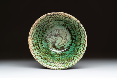 A Chinese green-glazed marbled bowl, probably Tang