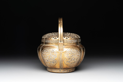A Chinese bronze 'landscape' handwarmer, Qiu Fuxi 丘福禧 mark, 19th C.