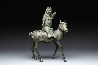 A Vietnamese bronze brush washer on stand and a Chinese bronze warrior on horseback, 19th C.