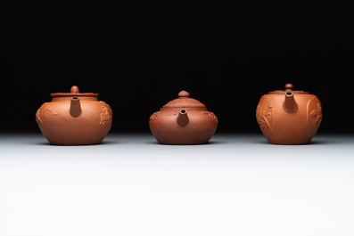 Three Chinese Yixing stoneware teapots and covers, 18th C.