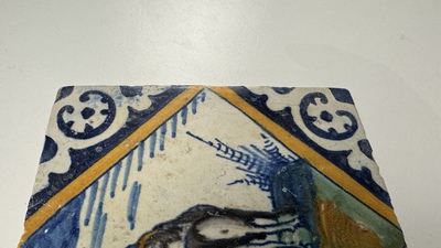 A polychrome Dutch Delft maiolica 'diamond' 'unicorn' tile, late 16th C.