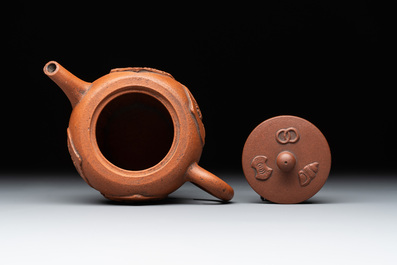 Three Chinese Yixing stoneware teapots and covers, 18th C.