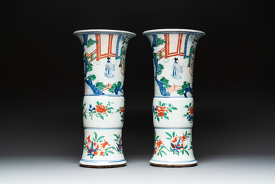 A pair of Chinese wucai 'gu' vases with narrative design, Transitional period