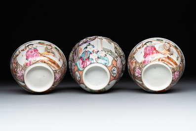 Three fine Chinese Canton famille rose 'mandarin subject' cups and saucers, Qianlong