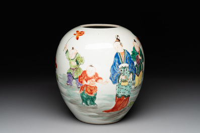 A Chinese famille rose 'ladies and boys' jar with wooden cover and stand, Yongzheng/Qianlong