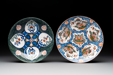 Eight polychrome Dutch Delft plates, 18th C.