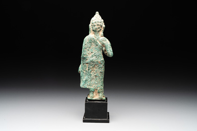 A bronze standing Buddha, Thailand, probably Mon Dvaravati period, 7/8th C.