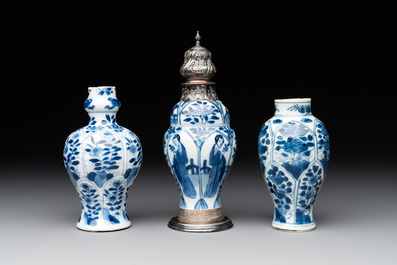 Two Chinese blue and white ewers and three vases, one silver mounted, Kangxi
