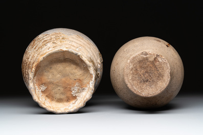 Eight stoneware jugs and mugs, and a glazed pottery vessel, Germany and The Netherlands, 16/17th C.