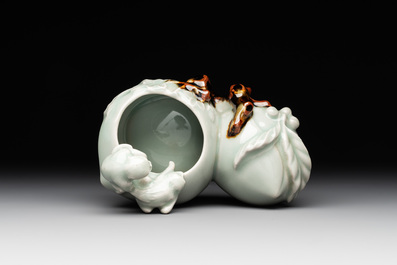 A Chinese celadon-glazed brush washer and a peanut nesting box, 20th C.