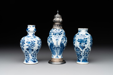 Two Chinese blue and white ewers and three vases, one silver mounted, Kangxi