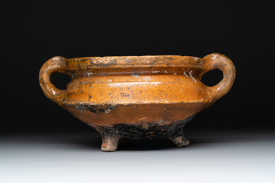 Eight stoneware jugs and mugs, and a glazed pottery vessel, Germany and The Netherlands, 16/17th C.
