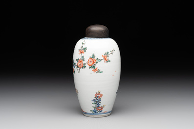 A Chinese famille verte ovoid tea caddy with floral design and a cup with figural design, Kangxi