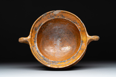 Eight stoneware jugs and mugs, and a glazed pottery vessel, Germany and The Netherlands, 16/17th C.