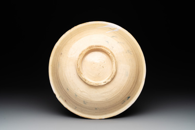 A proverbial blue, white and manganese dish, Makkum, Friesland, 1st half 19th C.