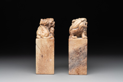 Two Chinese snuff bottles, four soapstone seals and a lacquer covered box, 20th C.