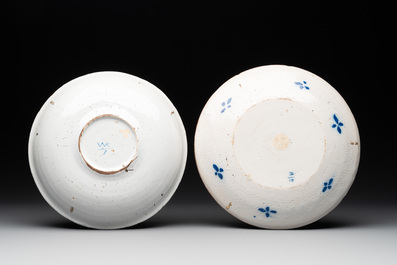 Eight polychrome Dutch Delft plates, 18th C.