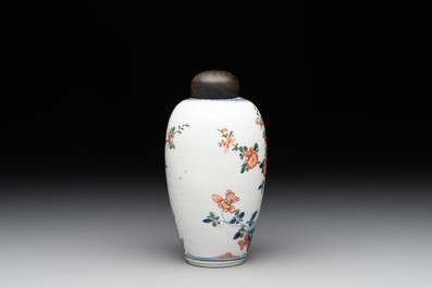 A Chinese famille verte ovoid tea caddy with floral design and a cup with figural design, Kangxi