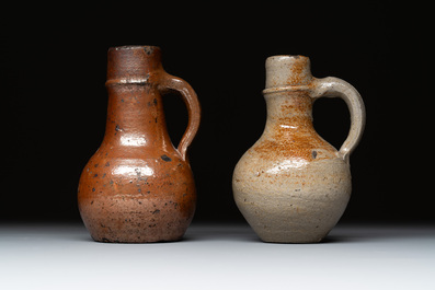 Eight stoneware jugs and mugs, and a glazed pottery vessel, Germany and The Netherlands, 16/17th C.