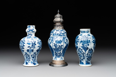 Two Chinese blue and white ewers and three vases, one silver mounted, Kangxi